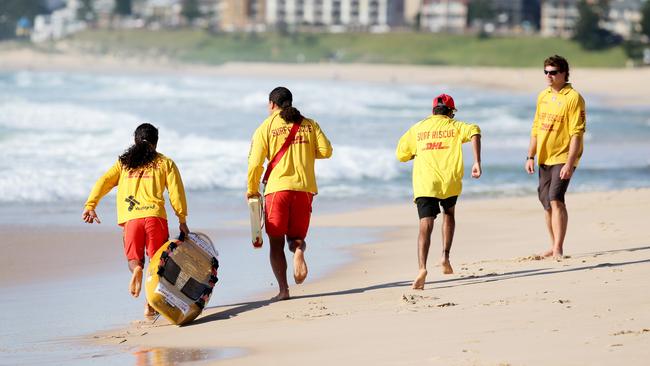 Joshua Rosenthal, (right), youth officer, with three detainees from Frank Baxter Juvenile Justice, who single handedly rescued two males in distress at North Entrance Beach. Picture: Peter Clark