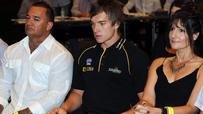 Martin flanked by his parents Shane and Kathy Knight on draft day. Picture: Herald Sun