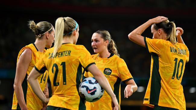 BRISBANE, AUSTRALIA - NOVEMBER 28: Winonah Heatley of Australia discusses tactics with team mates during the International Friendly match between the Matildas and Brazil at Suncorp Stadium on November 28, 2024 in Brisbane, Australia. (Photo by Albert Perez/Getty Images)