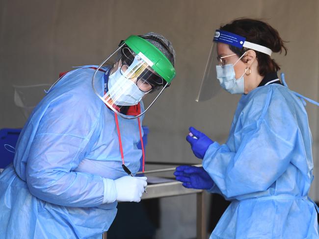 Health staff perform COVID-19 tests in Brisbane. Picture: NCA NewsWire / Dan Peled