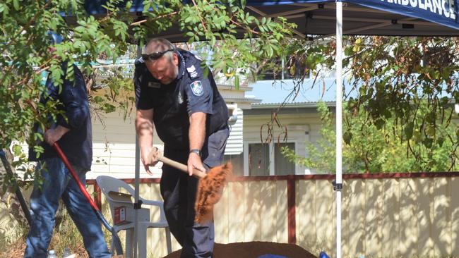 The search of the backyard has been going on for more than 24 hours.