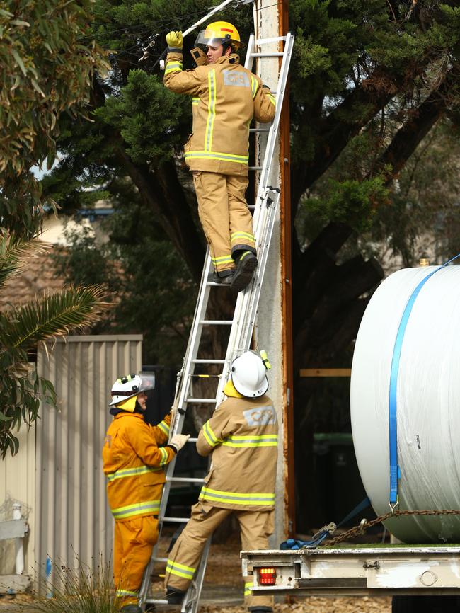 CFS repair power lines down at Aldinga Beach. Picture: Tait Schmaal.