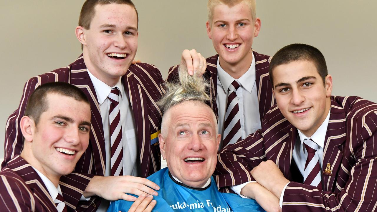 Then PAC principal Bradley Fenner surrounded by students for the World’s Greatest Shave. Picture: Tricia Watkinson