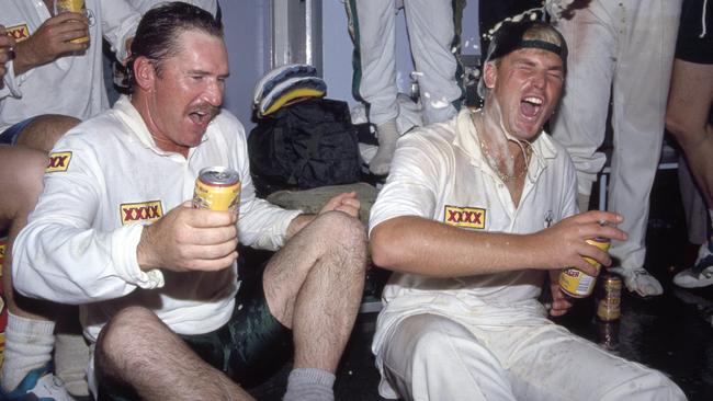 Allan Border and Warne celebrating after a Test match win over England.