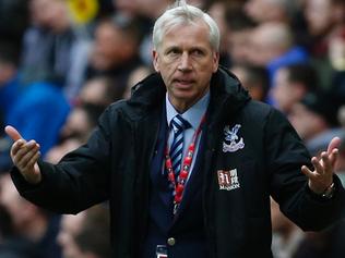 (FILES) This file photo taken on April 24, 2016 shows Crystal Palace's English manager Alan Pardew gesturing to the Palace fans during an FA Cup semi-final football match between Crystal Palace and Watford at Wembley Stadium in London on April 24, 2016. Alan Pardew has been sacked as Crystal Palace manager with the club just above the relegation places, the Premier League side's chairman Steve Parish said on on December 22, 2016. / AFP PHOTO / Ian Kington / NOT FOR MARKETING OR ADVERTISING USE / RESTRICTED TO EDITORIAL USE