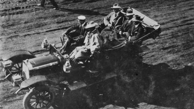 The Governor of Queensland, Lord Chelmsford, visits Kingaroy in 1909, seated with his chauffeur in Kingaroy Street, as residents gather to mark the occasion. Source: John Oxley Library, State Library of Queensland