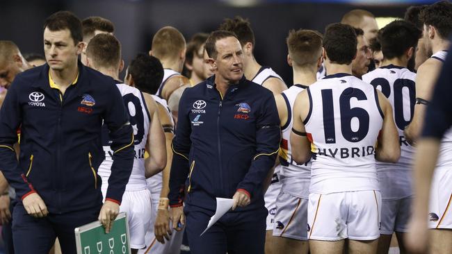 Crows Don Pyke leaves the quarter-time huddle in Adelaide’s final game against Carlton at Etihad Stadium in Melbourne. Picture: Daniel Pockett/AAP