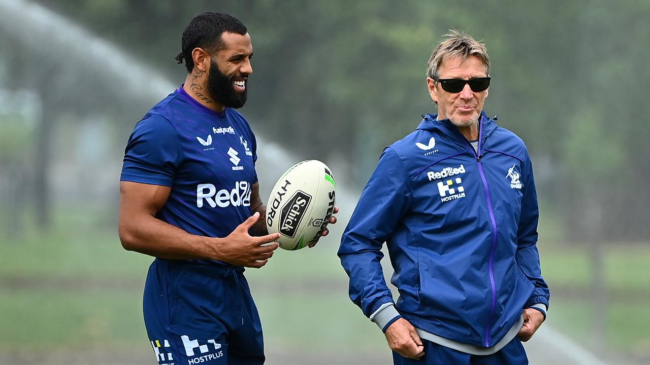 Josh Addo-Carr and Storm coach Craig Bellamy in Melbourne. Photo by Quinn Rooney/Getty Images)