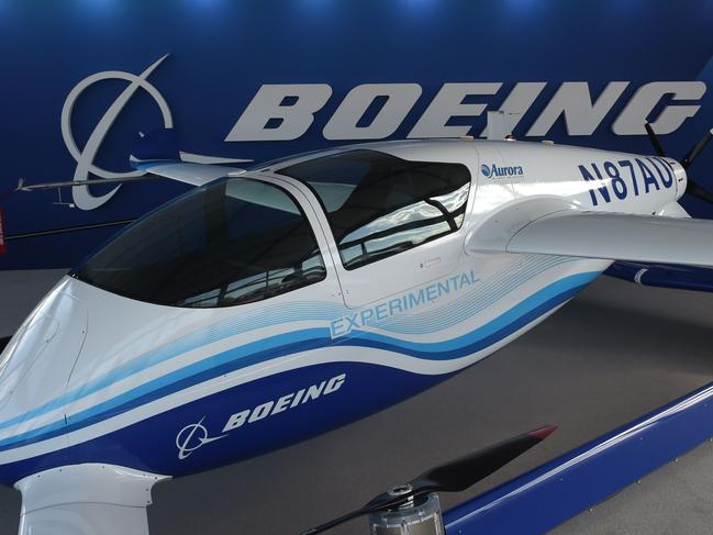 A Boeing 8 lift motors and one cruise propeller, experimental Passenger Air Vehicle is presented at the International Paris Air Show on June 19, 2019 at Le Bourget Airport, near Paris. (Photo by ERIC PIERMONT / AFP)