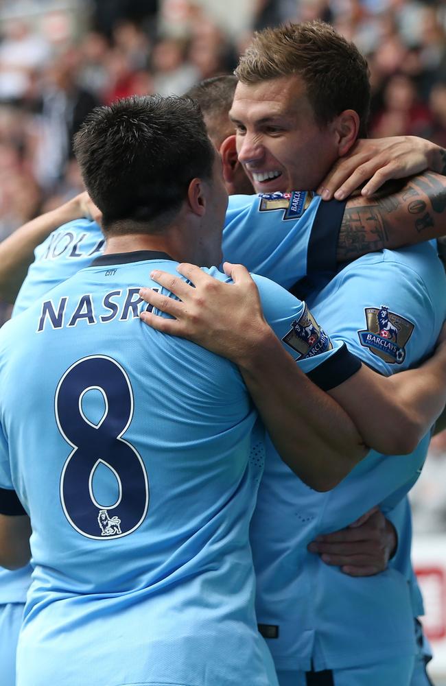 It’s all smiles among the City player’s after David Silva’s opener.