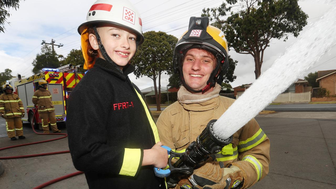 Emily Cooke on the host with firefighter Aiden Stary. Picture: Alan Barber