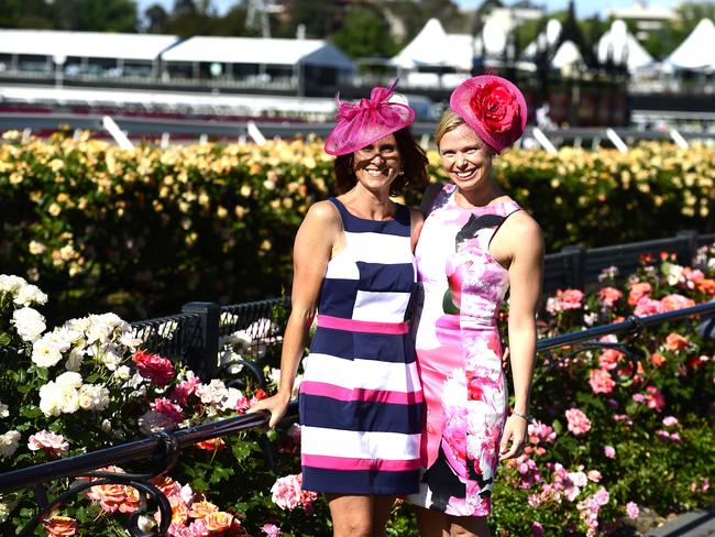 Sara Hooper and Bree Morris all dressed up at Flemington Racecourse on Melbourne Cup Day 2014. Picture: Stephen Harman.