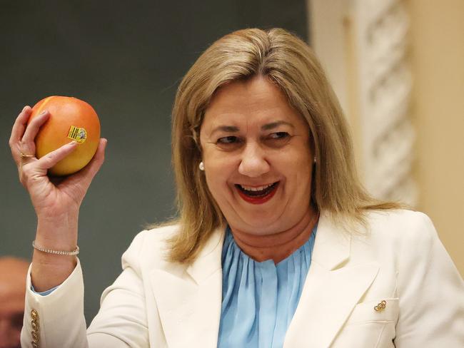 Premier Annastacia Palaszczuk with a R2E2 mango, Question Time, Parliament House, Brisbane. Picture: Liam Kidston