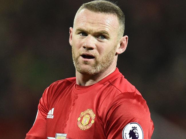 Manchester United's English striker Wayne Rooney is pictured during the English Premier League football match between Manchester United and Liverpool at Old Trafford in Manchester, north west England, on January 15, 2017. / AFP PHOTO / Oli SCARFF / RESTRICTED TO EDITORIAL USE. No use with unauthorized audio, video, data, fixture lists, club/league logos or 'live' services. Online in-match use limited to 75 images, no video emulation. No use in betting, games or single club/league/player publications. /