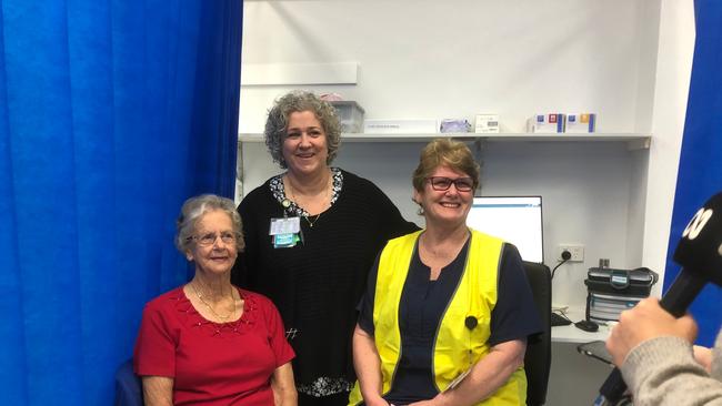 FIRST JAB: Fay Birrney, 83, was delighted to be the first person to receive a COVID-19 Jab at the NNSWLHD's new clinic at Lismore Square. L-R Ms Birney, Lismore Base Hospital Clinic and Lismore Square Clinic Manager, Sandra Vidler and nurse Schipanski. Photo: Alison Paterson