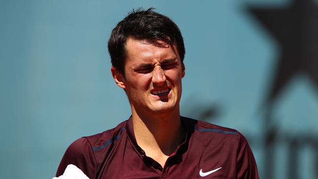 Bernard Tomic withdrew in Rome after eight minutes