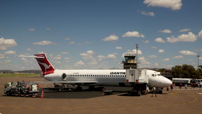 A QantasLink Boeing 717 on the tarmac at Alice Springs Airport destined for Darwin. The flight services will be upgraded from 717 to 737 aircraft