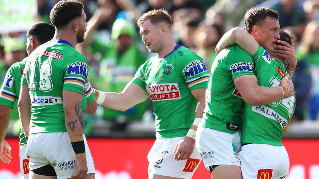 CANBERRA, AUSTRALIA - AUGUST 27: Tom Starling of the Raiders celebrates with teammates after scoring a try during the round 24 NRL match between the Canberra Raiders and the Manly Sea Eagles at GIO Stadium on August 27, 2022 in Canberra, Australia. (Photo by Jason McCawley/Getty Images)