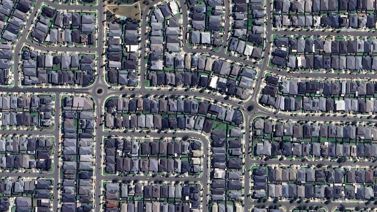 Huge houses on tiny blocks, like in recently developed Oran Park, are responsible for killing off the backyard – not apartments. Picture: Google Earth