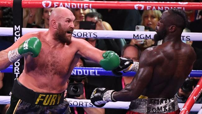 Fury and Wilder went to war. (Photo by Robyn Beck / AFP)