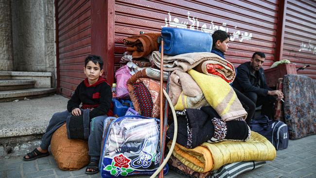 Displaced Palestinians arrive in Deir al-Balah. Picture: AFP