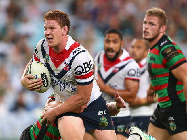 SYDNEY, AUSTRALIA - APRIL 08: Dylan Napa of the Roosters is tackled during the round six NRL match between the South Sydney Rabbitohs and the Sydney Roosters at ANZ Stadium on April 8, 2016 in Sydney, Australia. (Photo by Cameron Spencer/Getty Images)