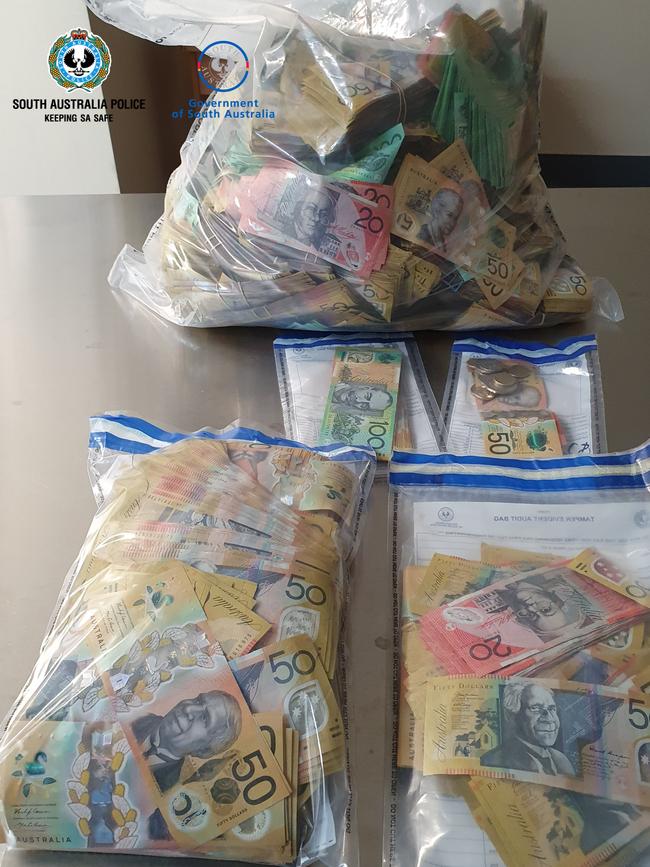 Nearly a million dollars in cash was seized in the hotel room raid. Picture: SAPOL