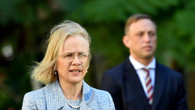 Chief Health Officer Dr Jeannette Young (left) and Queensland Deputy Premier and Minister for Health and Minister for Ambulance Services, Steven Miles (right) are seen during a press conference at Queensland Parliament House in Brisbane, Tuesday, June 2, 2020. The Queensland government is under pressure after the misdiagnosis of COVID-19 for Blackwater man Nathan Turner who died last week. (AAP Image/Darren England) NO ARCHIVING