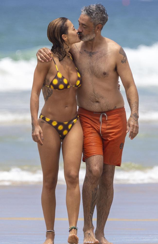 Rita and Taika were spotted cooling off the ocean and kissing as they left the waves. Picture: MEDIA-MODE