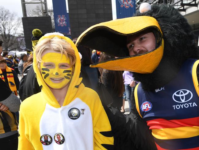 Tigers and Crows fans at the MCG. Picture: AAP Image/Julian Smith