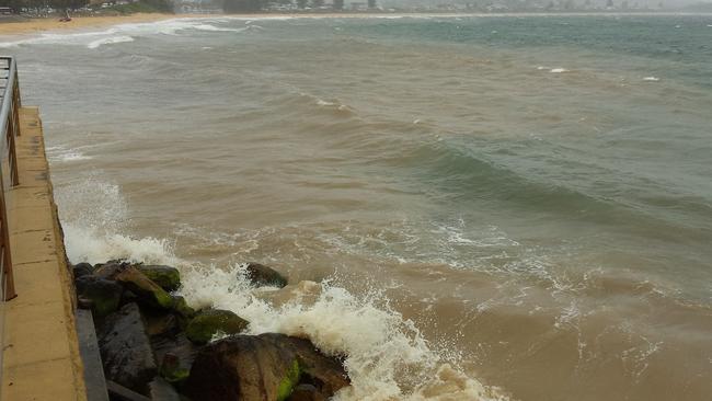 Terrigal water quality: Terrigal beach water turned brown by stormwater run-off.