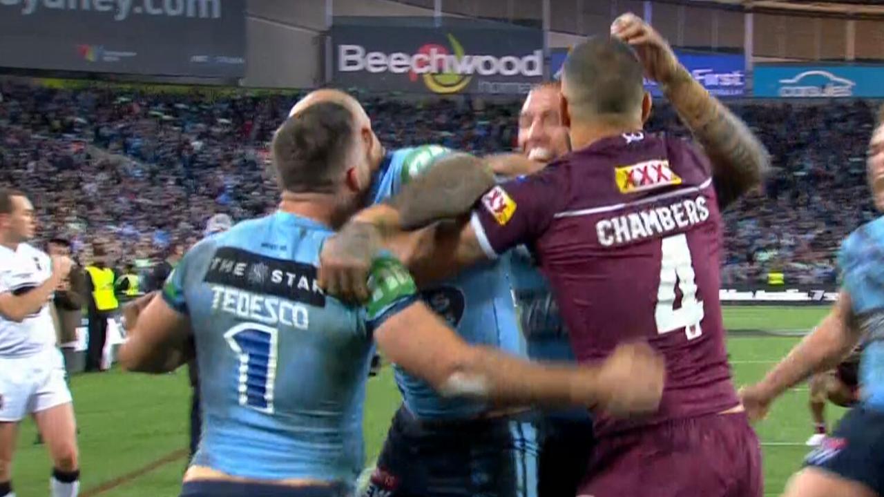 Blues players celebrate James Tedesco's last minute match winning try.