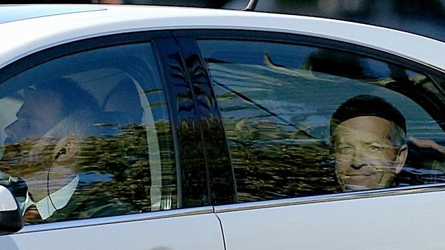 Mr Shorten is driven along Treasury Place as media wait outside Mr Andrews Cabinet meeting. Picture Mark Stewart