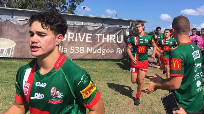 The Wynnum Manly Mal Meninga team takes to the field.