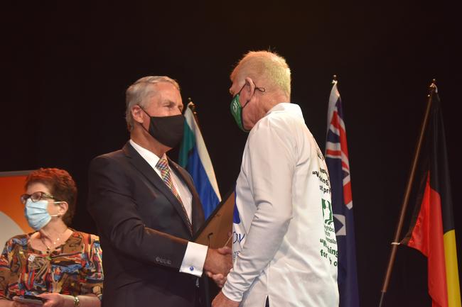 Mackay Mayor Greg Williamson with Mackay Citizen of the Year Frank Cowell at the Mackay Australia Day awards at the MECC on January 25, 2022. Picture: Lillian Watkins