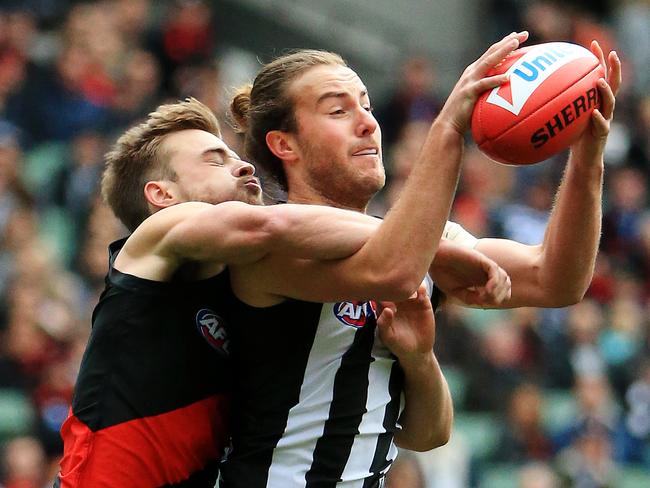 2017 AFL Football Round 16: Collingwood vs. Essendon at the MCG. Tim Broomhead takes the grab. Picture: Mark Stewart