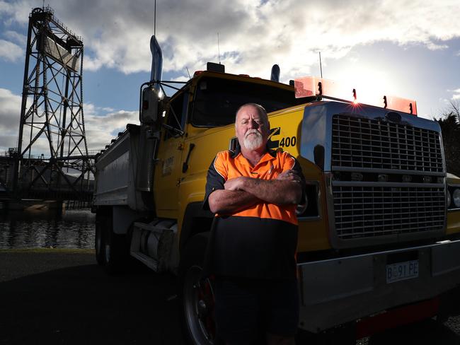 Scott Moore and his yellow Ford tipper truck, which he loaded up with eight tonnes of donated cow manure. Picture: NIKKI DAVIS-JONES