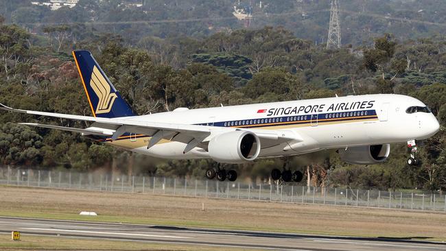 A Singapore Airlines plane landing in Melbourne. Picture: David Crosling