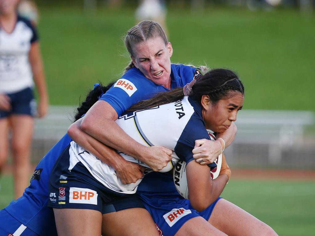 Gold Stars' Jasmine Peters is chased down by Diehards captain Ali Brigginshaw in the QRL BHP Premiership match between the North Queensland Gold Stars and the Valleys Diehards, held at Barlow Park. Picture: Brendan Radke