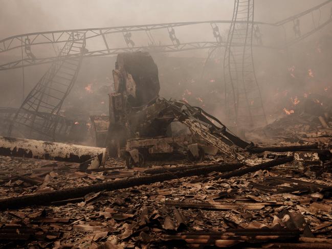 Smoke rises as flames burn at a train station in Seversk, eastern Ukraine on May 8, 2022, after the facility was targeted by missile strikes amid the Russian invasion of Ukraine. Picture: Yasuyoshi Chiba / AFP.