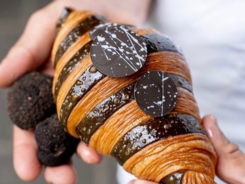 She purchased six of the $17 truffle croissants for $102.