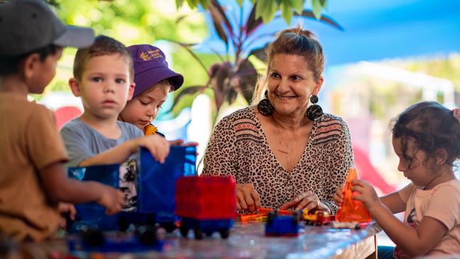 Irene Billias has been named the NT's favourite childcare educator. She is joined here by Arjun Pushpala, Costa Billias, Marianthi Kotis, and Sevasti Skartados. Picture: Che Chorley