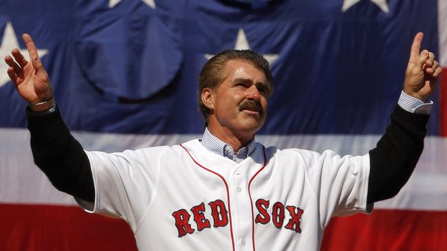 Former Boston Red Sox player Bill Buckner acknowledges the cheers from the crowd before throwing out the ceremonial first pitch at the baseball game between the Boston Red Sox and Detroit Tigers in 2008 at Fenway Park in Boston, Massachusetts. Picture: Brian Snyder-Pool/Getty