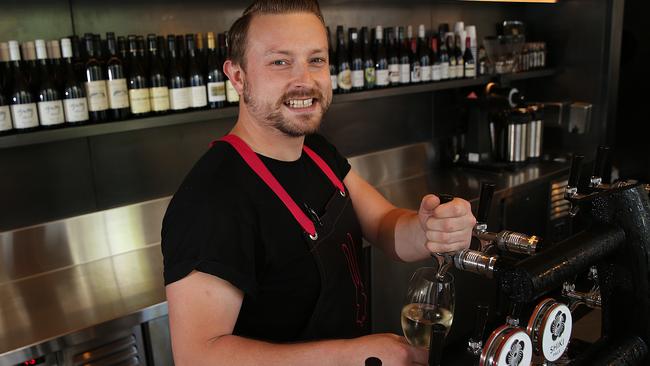 Bartender Oscar Smith pours wine from a tap at the newly opened Chin Chin Sydney. Picture: Danny Aarons