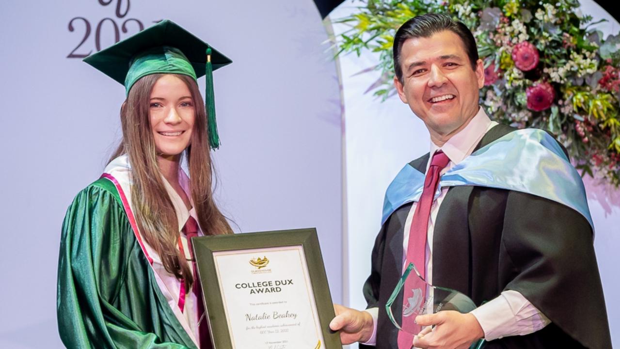 Natalie Beakey receiving her Dux award at the 2021 Glasshouse Christian College Graduation Ceremony. Natalie is presented with the award by GCC Principal Mike Curtis. Picture: Jordan Bull