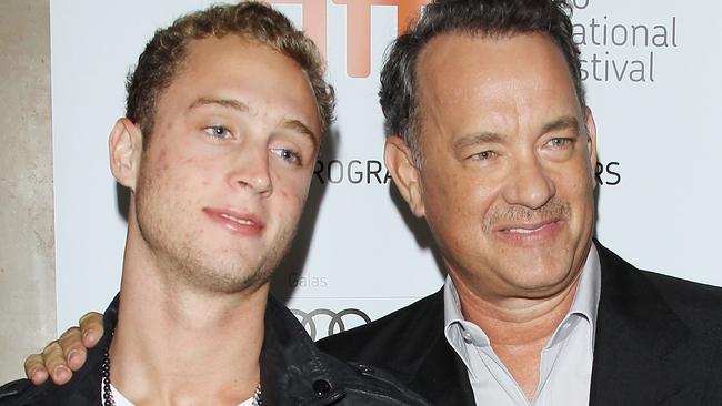 TORONTO, ON - SEPTEMBER 08:  Tom Hanks (R) and his son Chet Hanks arrive at "Cloud Atlas" premiere during the 2012 Toronto International Film Festival held at Princess of Wales Theatre on September 8, 2012 in Toronto, Canada.  (Photo by Michael Tran/FilmMagic)