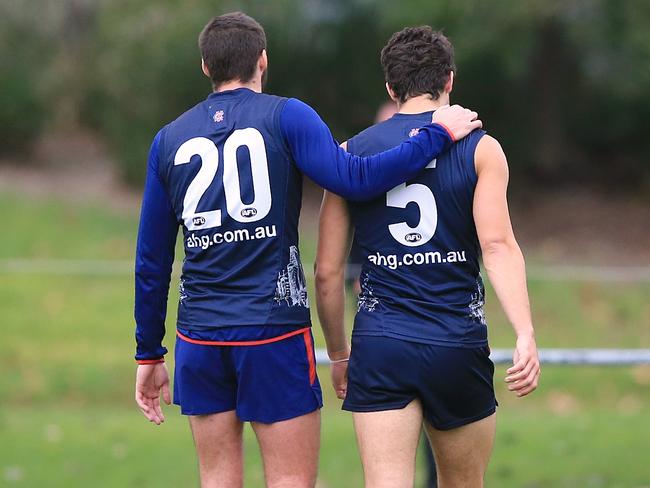 Melbourne football training Christian Petracca & Colin Garland leave the track early Picture: Wayne Ludbey