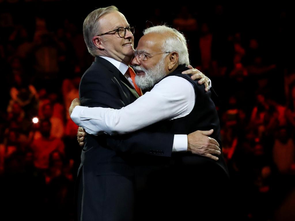 India's Prime Minister Narendra Modi embraces Anthony Albanese at an Indian cultural event in Sydney. Picture: Lisa Maree Williams/Getty Images
