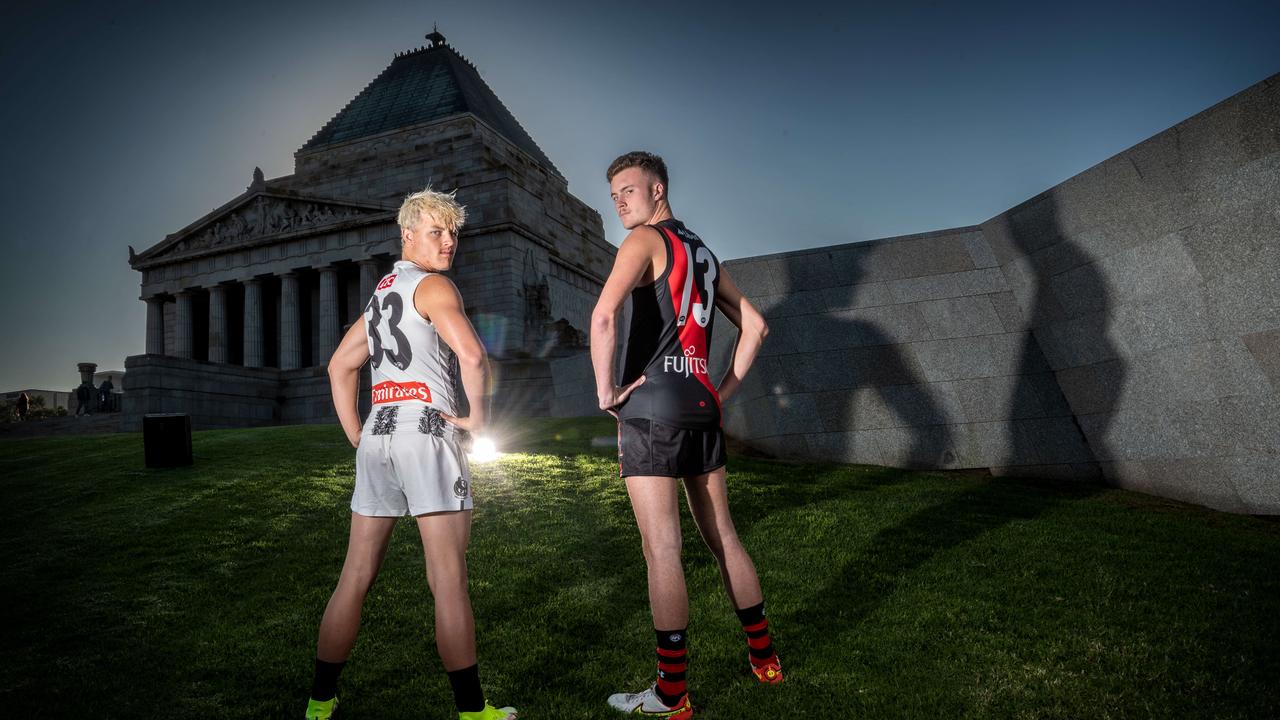 Jack Ginnivan (left) and Nik Cox (right), whose numbers were worn by WWII soldier Norm Le Brun. Picture: Tony Gough
