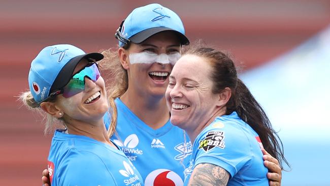 Strikers players celebrate the win over the Scorchers. Picture: Cameron Spencer/Getty Images